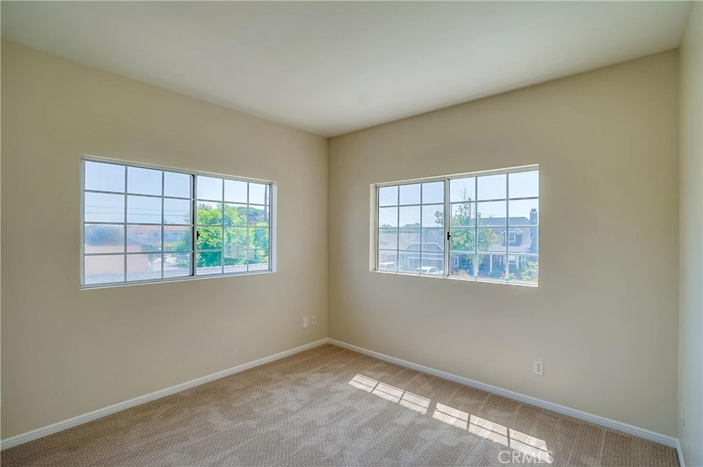 19614 Darien Place Torrance, CA 90503 - Photo 45 of 72 an empty room with windows