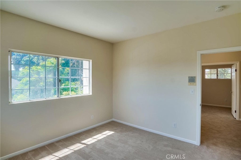 19614 Darien Place Torrance, CA 90503 - Photo 46 of 72 an empty room with windows