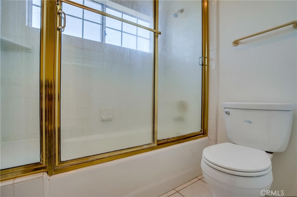 19614 Darien Place Torrance, CA 90503 - Photo 49 of 72 a bathroom with a toilet and shower