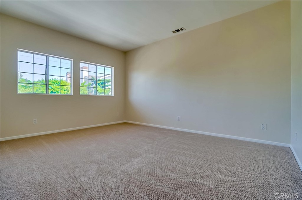 19614 Darien Place Torrance, CA 90503 - Photo 50 of 72 an empty room with windows
