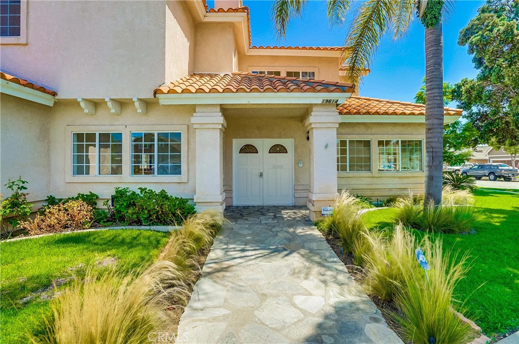 19614 Darien Place Torrance, CA 90503 - Photo 5 of 72 a view of a house with a yard