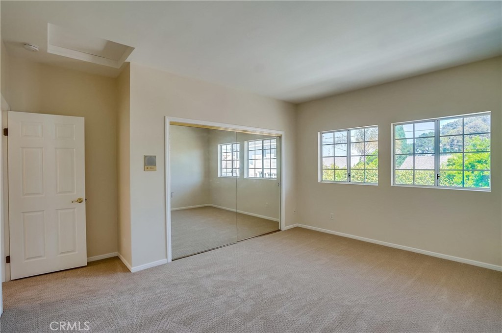 19614 Darien Place Torrance, CA 90503 - Photo 51 of 72 an empty room with windows
