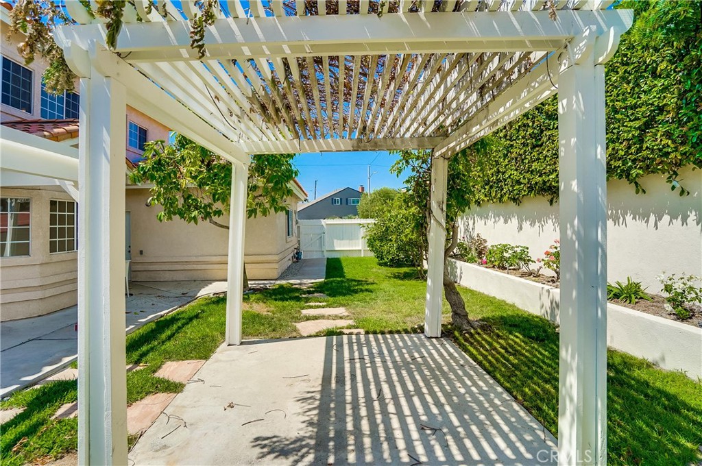 19614 Darien Place Torrance, CA 90503 - Photo 68 of 72 a view of a house with a small yard and plants