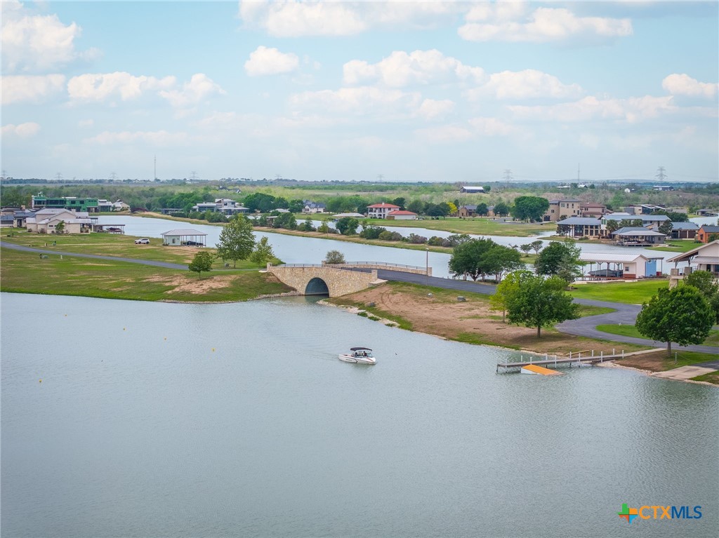 114 River Ranch Circle Martindale, TX 78655 - Photo 11 of 17 a view of a lake with a city