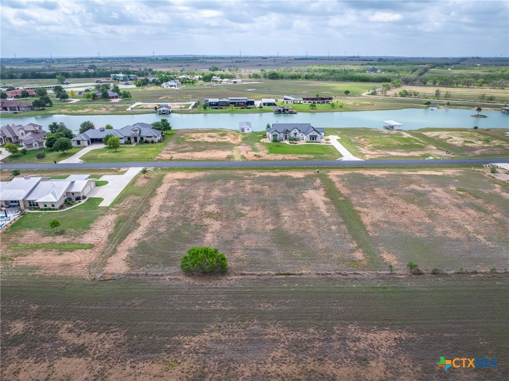 114 River Ranch Circle Martindale, TX 78655 - Photo 4 of 17 a view of a city with an ocean