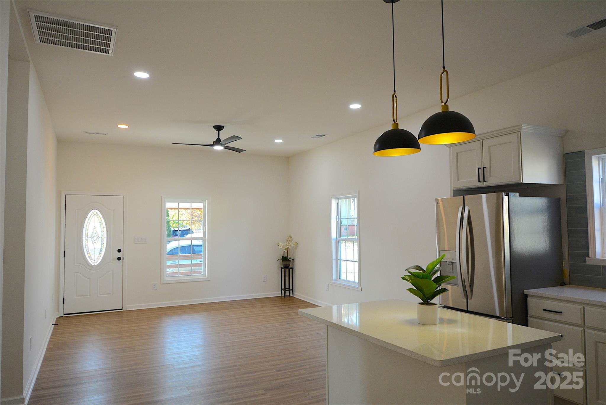 62 Fourth Street Cramerton, NC 28032 - Photo 8 of 26 a view of an entryway with wooden floor