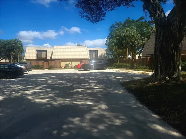 a view of a street with a building