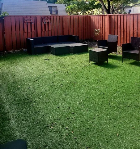 a view of a backyard with a garden