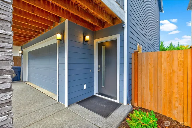 a view of backyard with tub and stairs