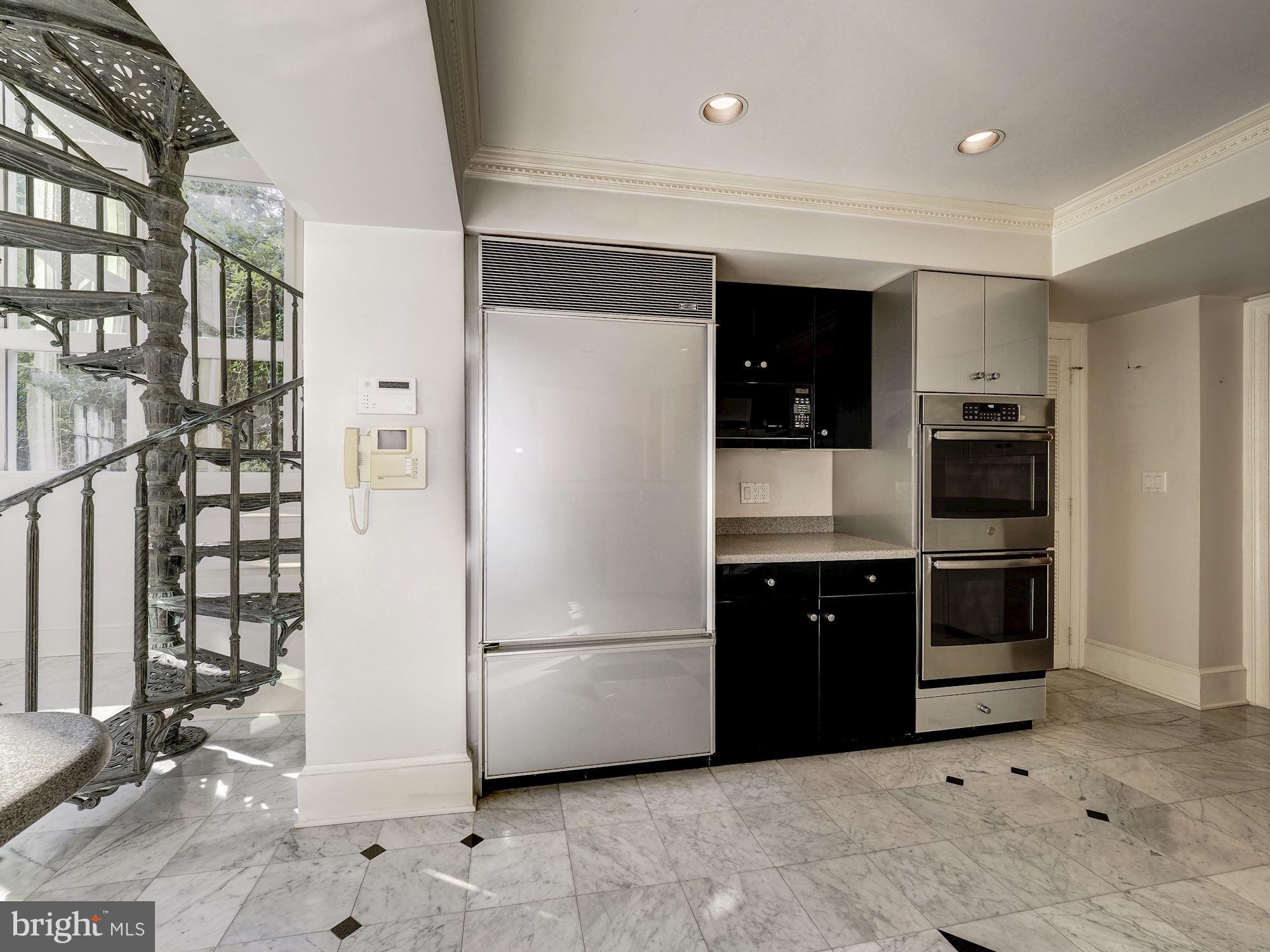 11040 River Road Potomac, MD 20854 - Photo 14 of 38 Kitchen with Spiral Staircase