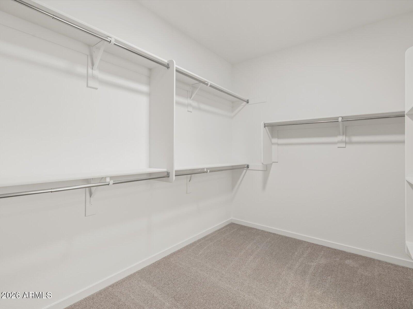 2380 Grenache Road San Tan Valley, AZ 85143 - Photo 15 of 78 a view of an empty walk in closet