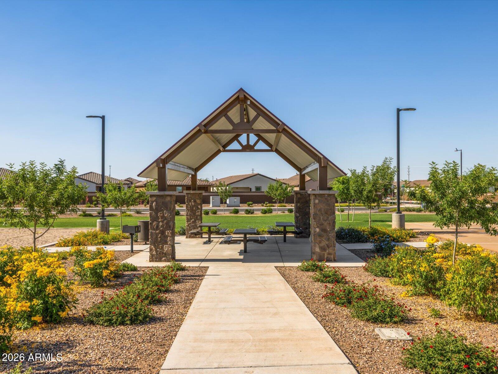 2380 Grenache Road San Tan Valley, AZ 85143 - Photo 68 of 78 a front view of a house with garden