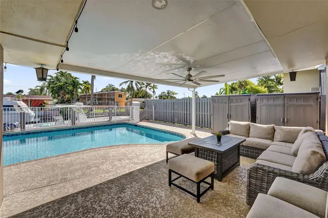 a outdoor living space with furniture and a couch