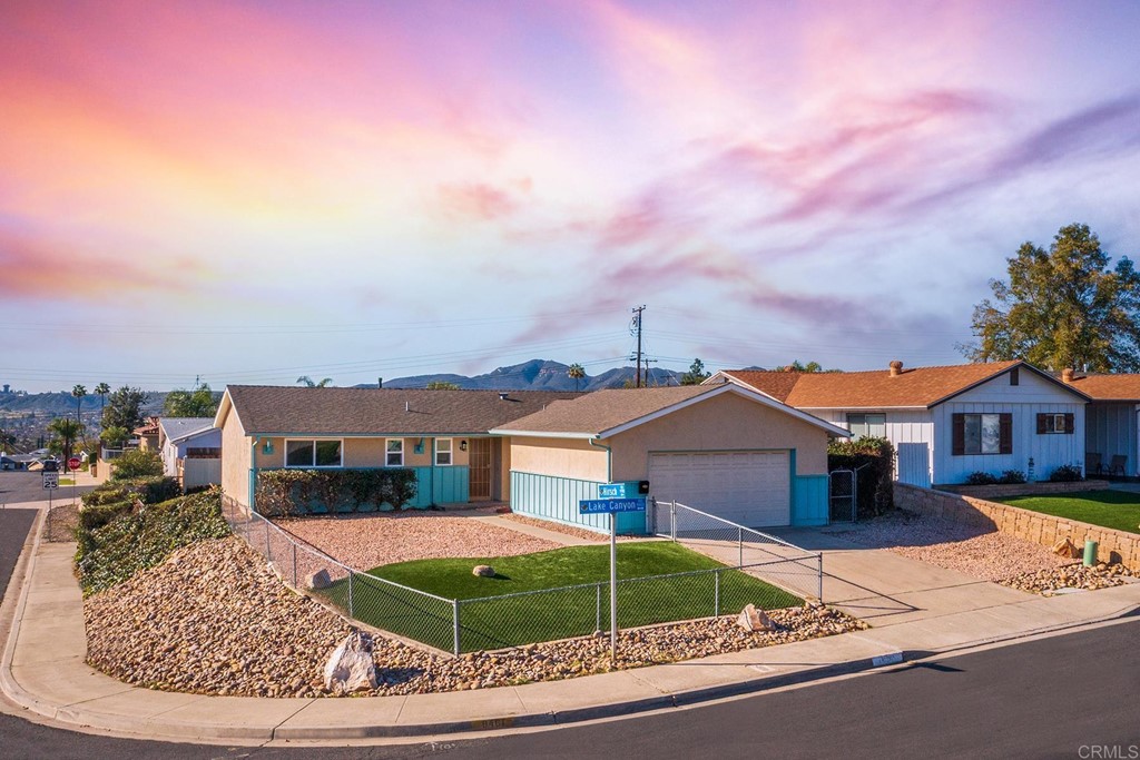 9461 Lake Canyon Road Santee, CA 92071 - Photo 1 of 1 a front view of a house with garden