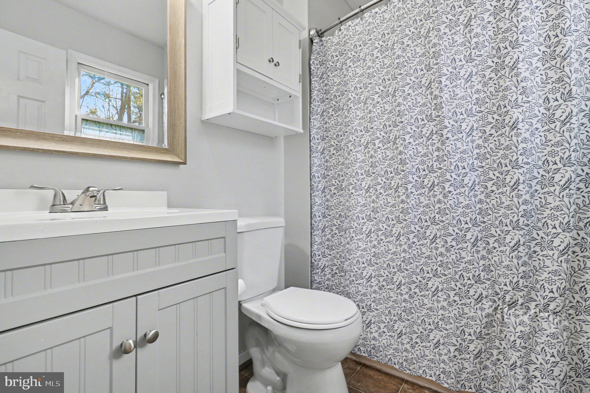 426 Durham Drive Ruther Glen, VA 22546 - Photo 15 of 33 a bathroom with a toilet and a sink