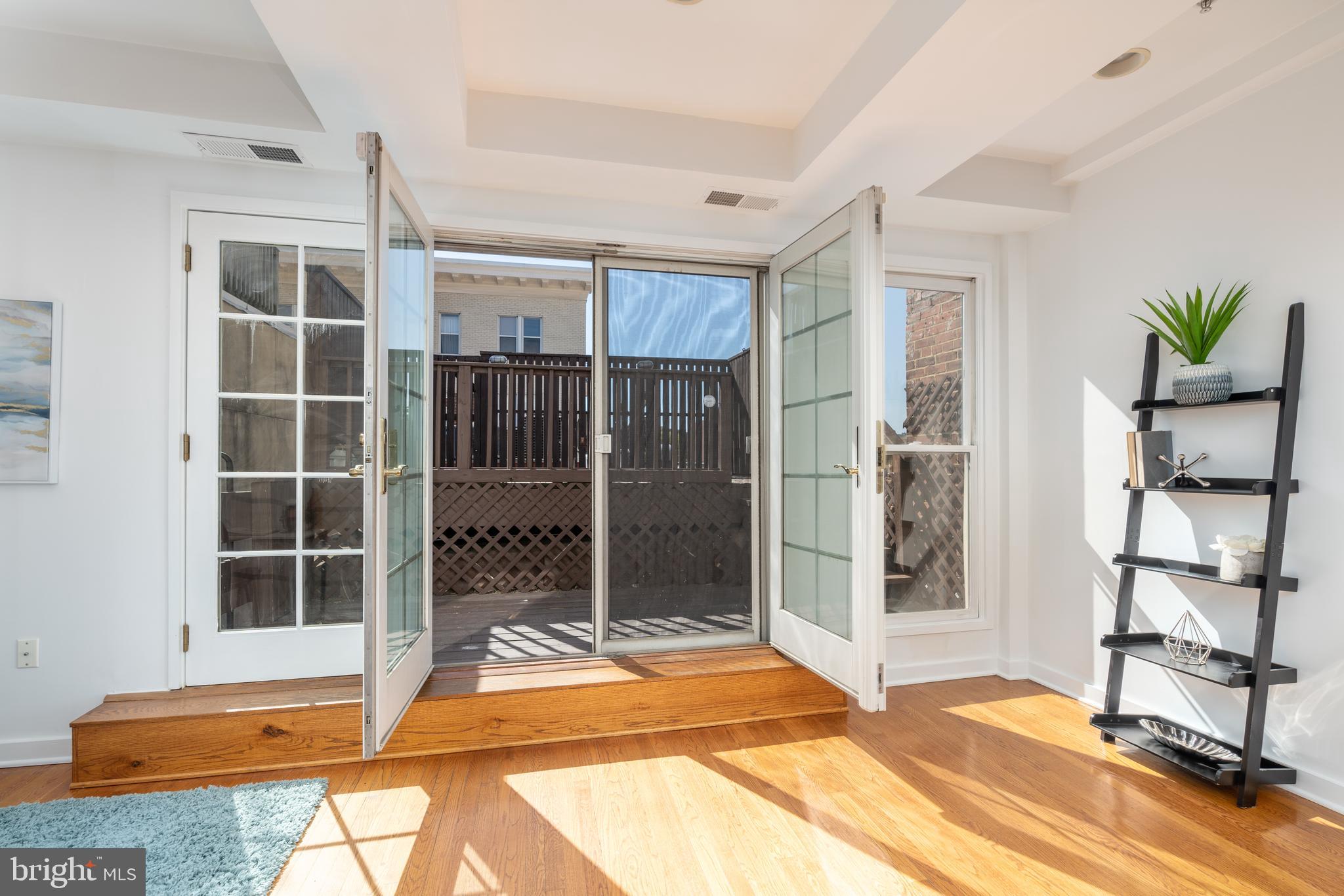 1706 16th Street Northwest, Unit 6 Washington, DC 20009 - Photo 19 of 27 Doors open to roof deck