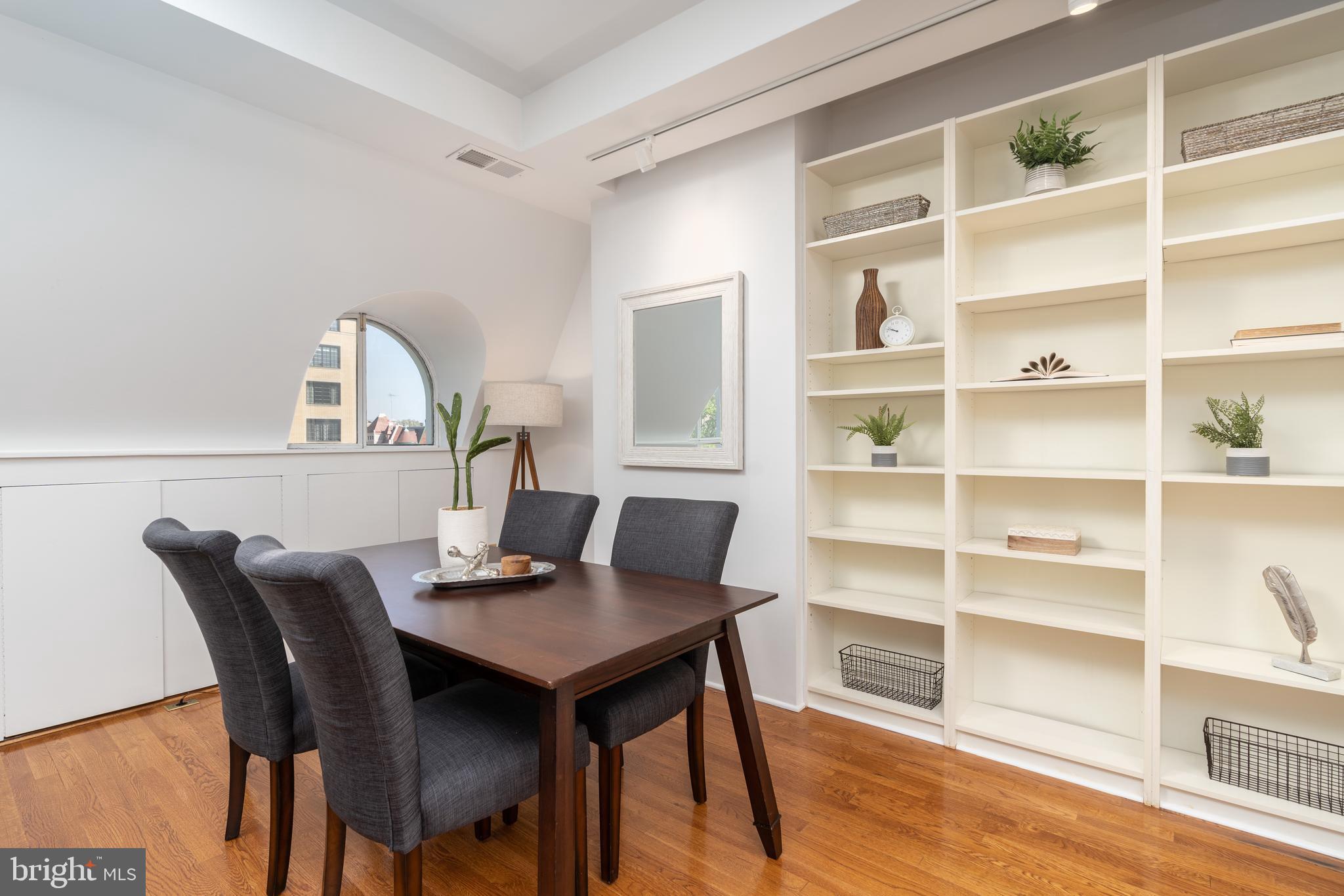 1706 16th Street Northwest, Unit 6 Washington, DC 20009 - Photo 7 of 27 Dining area with bookshelves