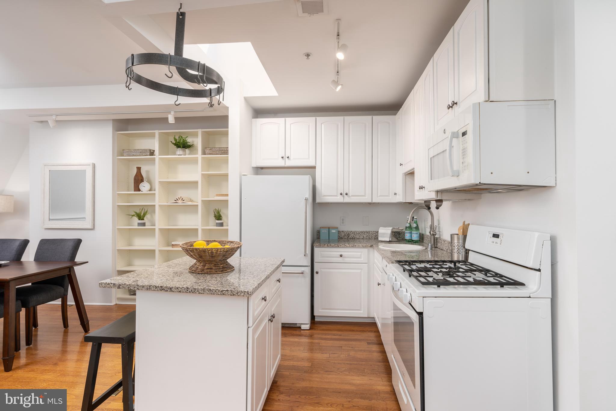 1706 16th Street Northwest, Unit 6 Washington, DC 20009 - Photo 9 of 27 Kitchen open to living and dining area