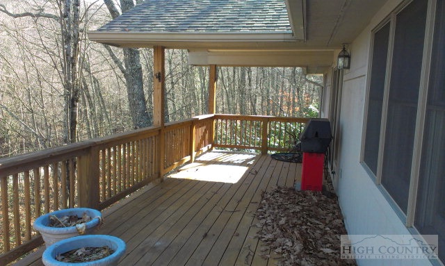 706 Pine Ridge Road Beech Mountain, NC 28604 - Photo 8 of 16 a view of balcony with wooden floor