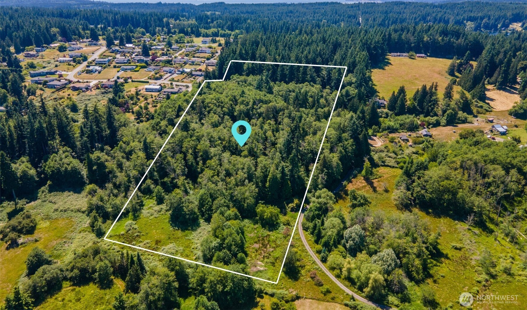 0 East Heggeness Road Clinton, WA 98236 - Photo 1 of 19 a view of a yard