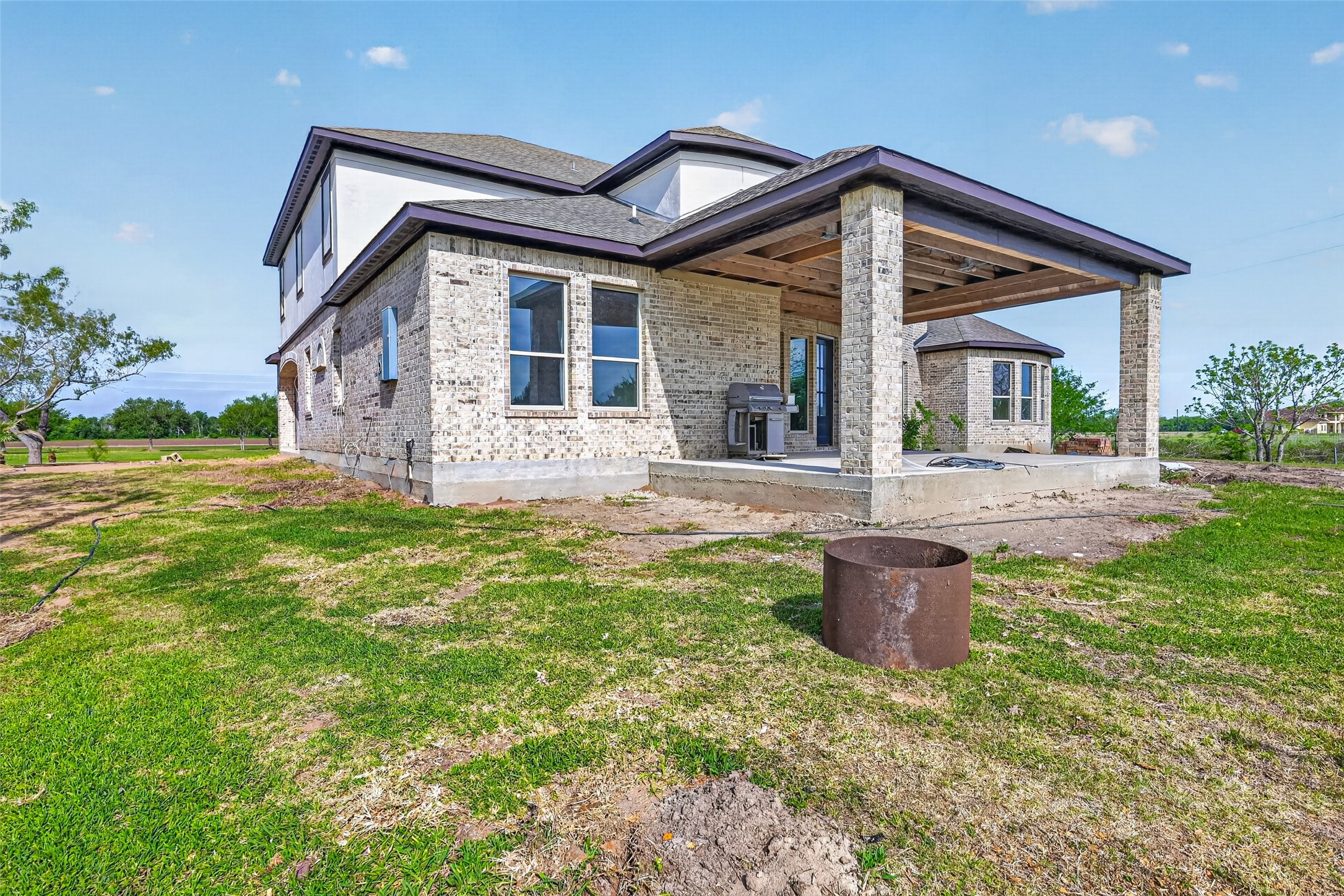 8023 Pool Hill Road Fulshear, TX 77441 - Photo 22 of 50 a front view of house with a garden