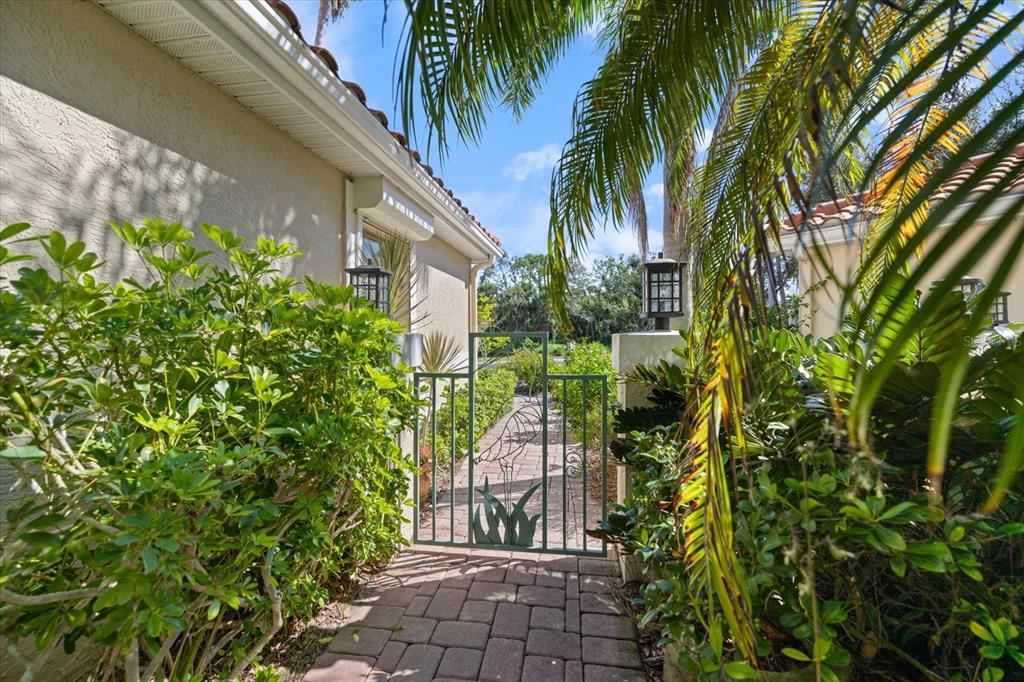 447 Oak Point Road Osprey, FL 34229 - Photo 15 of 99 a view of a garden with plants