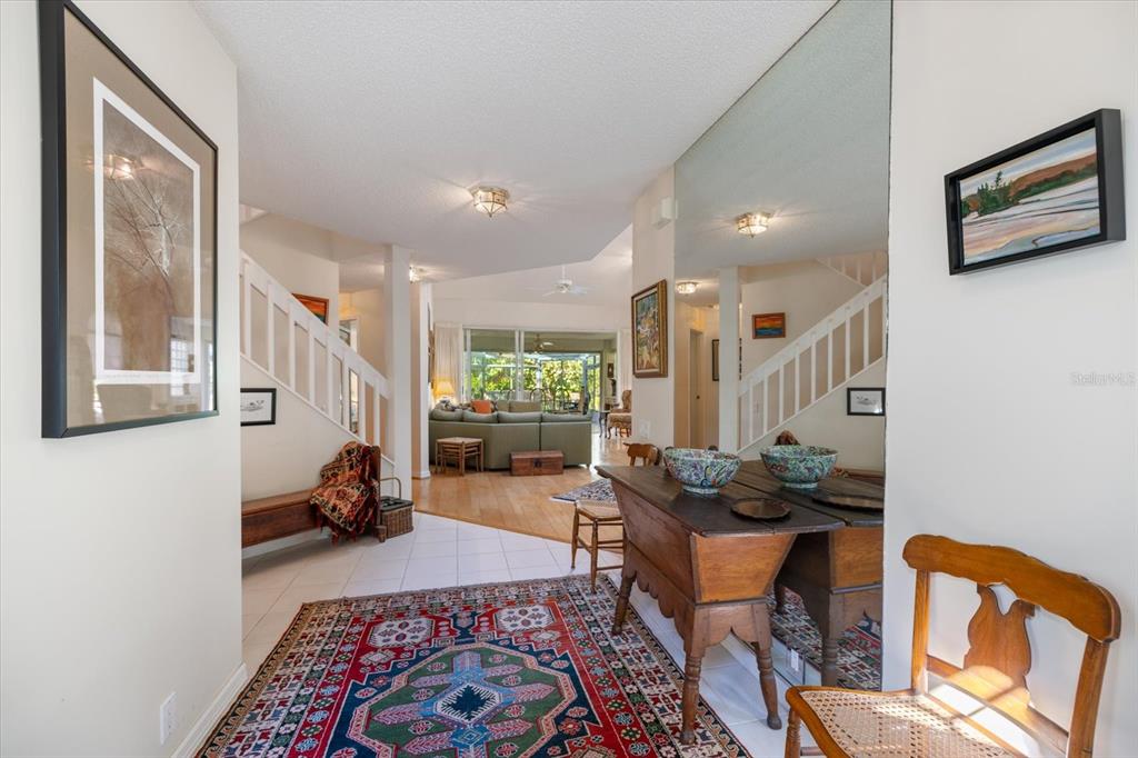 447 Oak Point Road Osprey, FL 34229 - Photo 19 of 99 a living room with furniture and a rug