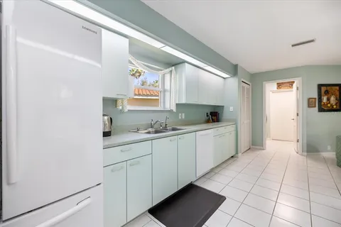a bathroom with a bathtub and a sink