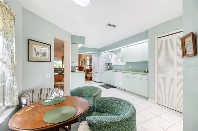 a bathroom with a glass shower door and a shower