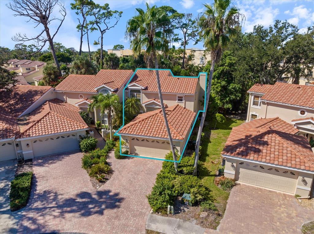 447 Oak Point Road Osprey, FL 34229 - Photo 3 of 99 an aerial view of a house with garden space and a street