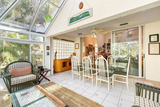 a view of a building with a table and chairs