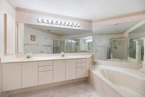 a view of a backyard with sitting area