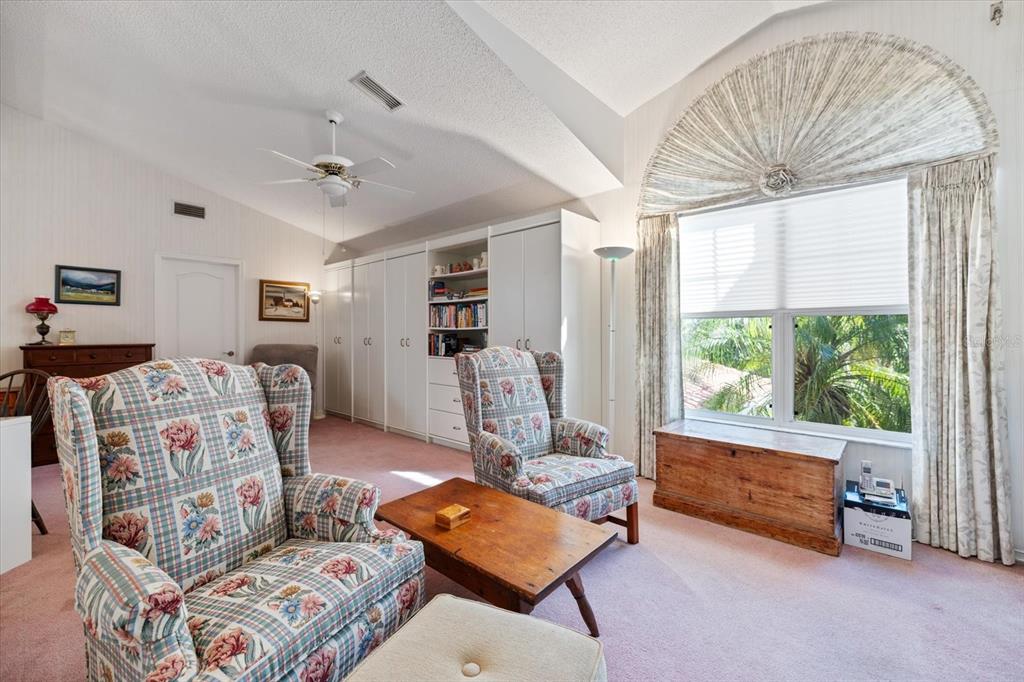 447 Oak Point Road Osprey, FL 34229 - Photo 54 of 99 a bedroom with furniture and a window