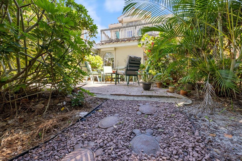 447 Oak Point Road Osprey, FL 34229 - Photo 70 of 99 a view of a house with a yard and sitting area