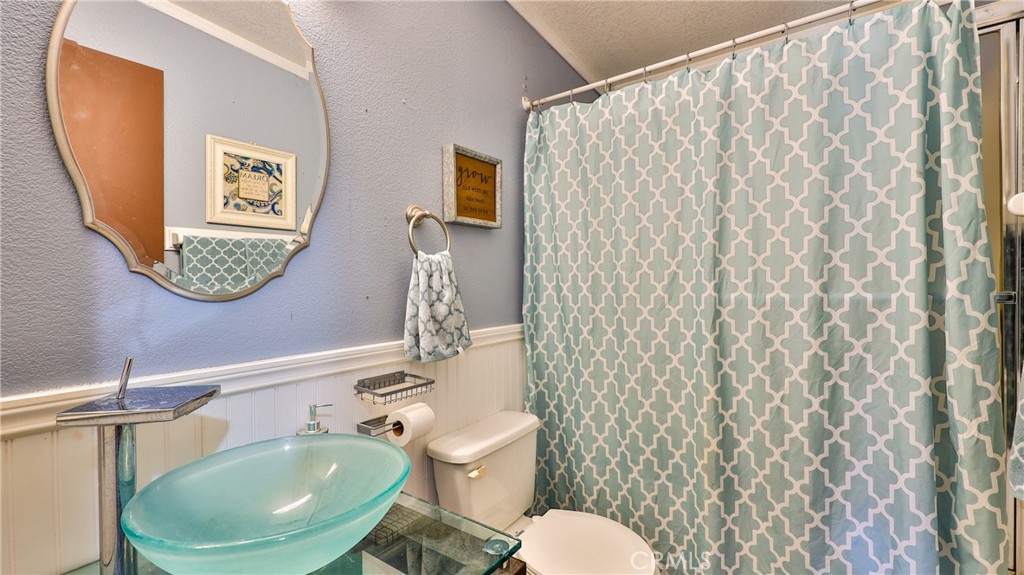 39550 Kirby Road Anza, CA 92539 - Photo 38 of 53 a bathroom with a toilet and a sink