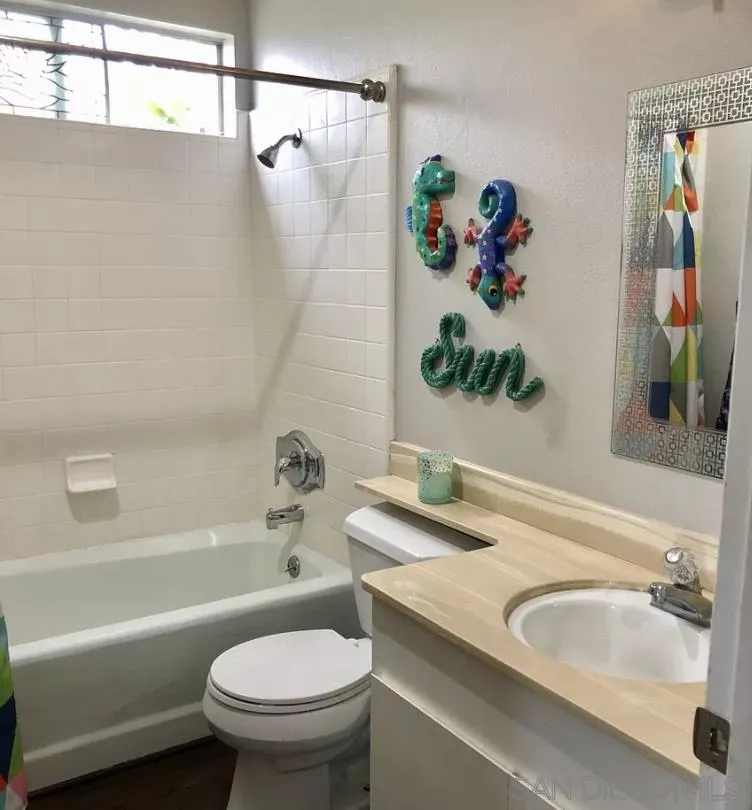 660 San Mario Drive Solana Beach, CA 92075 - Photo 12 of 25 a bathroom with a sink a toilet and a bathtub