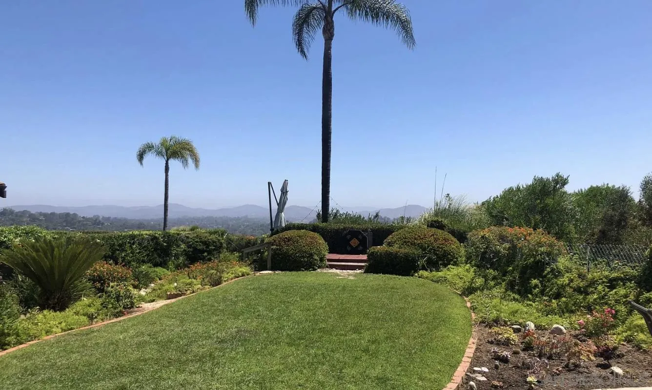 660 San Mario Drive Solana Beach, CA 92075 - Photo 21 of 25 a view of a garden with a tall tree