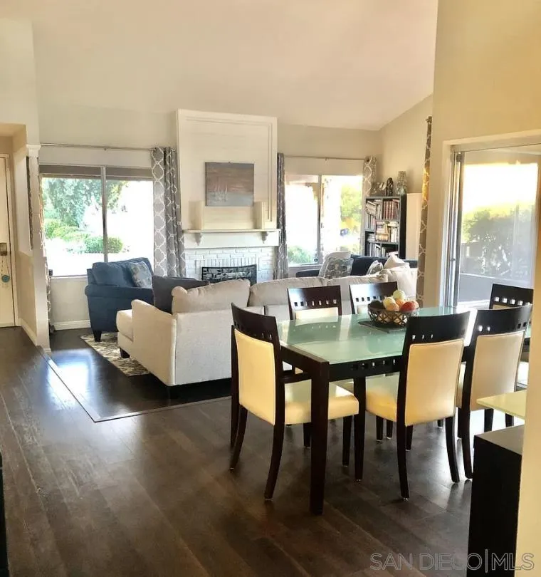 660 San Mario Drive Solana Beach, CA 92075 - Photo 3 of 25 a view of a dining room with furniture and wooden floor