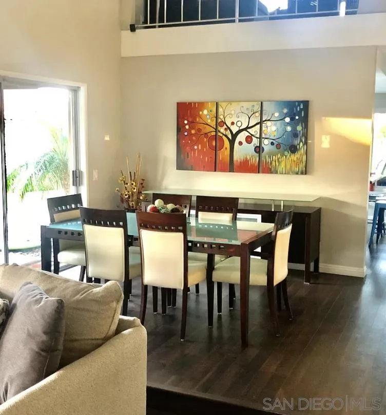 660 San Mario Drive Solana Beach, CA 92075 - Photo 4 of 25 a view of a dining room with furniture and wooden floor