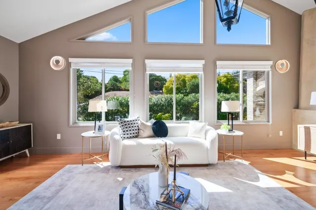 a white bath tub sitting next to a white sink