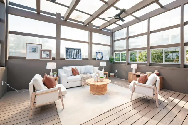 a living room with furniture and a couch