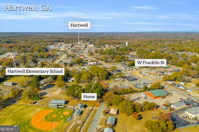 an aerial view of residential building with parking space