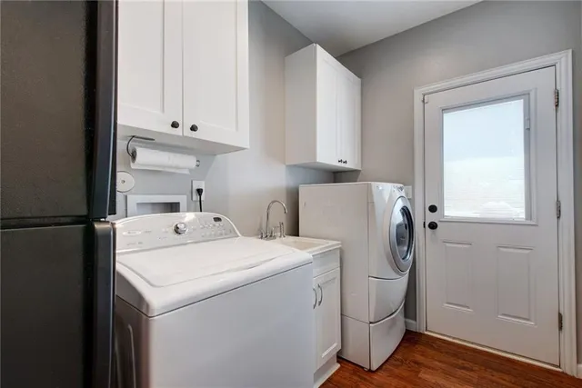 a utility room with dryer and washer