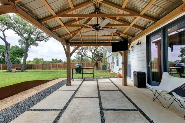 a view of yard with a patio