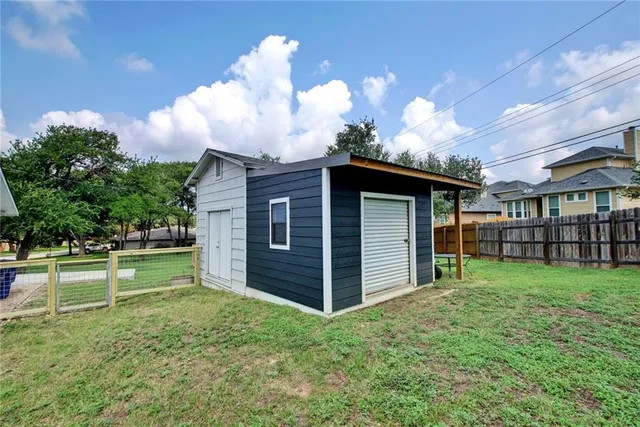a view of a backyard with a garden