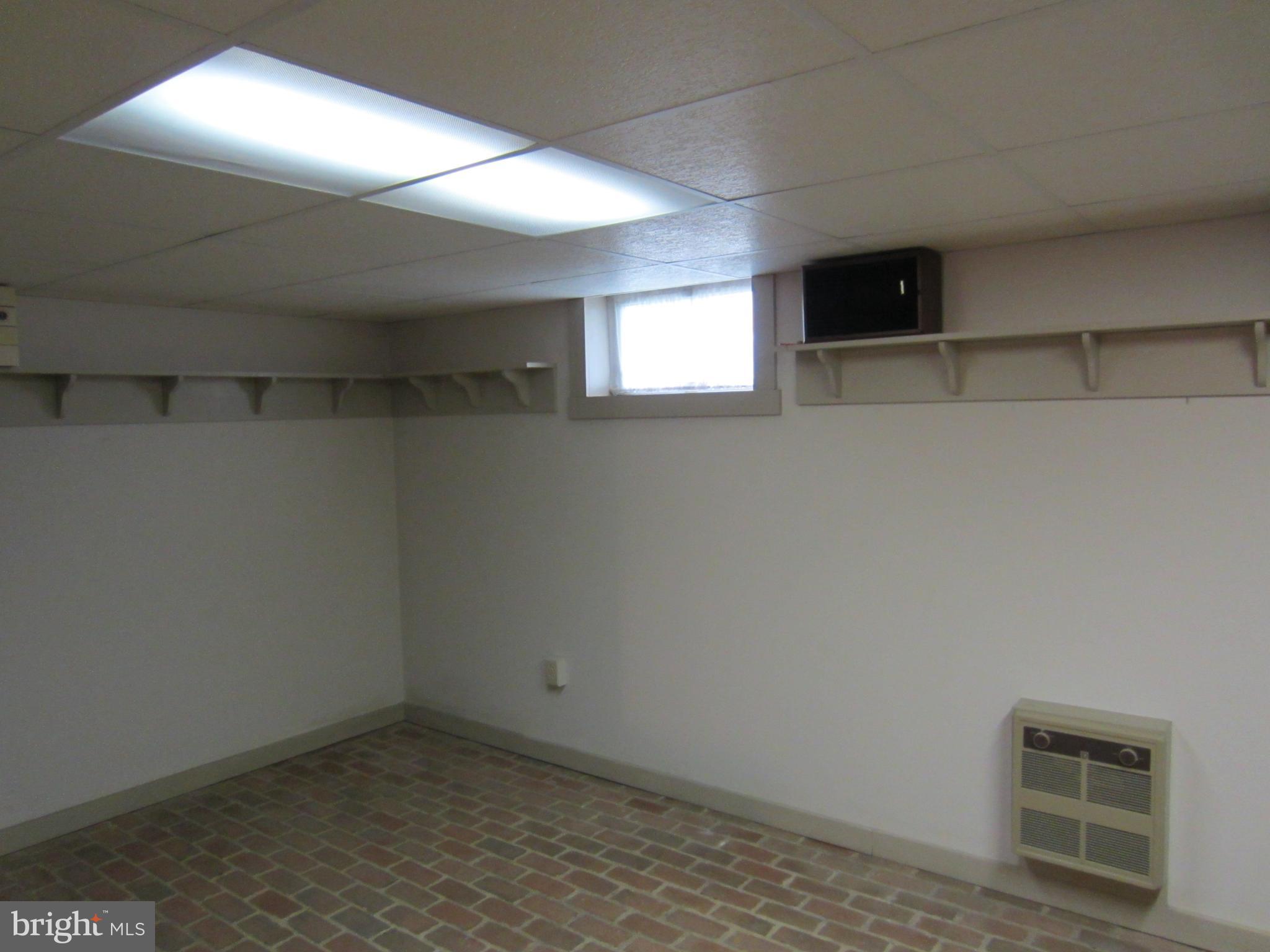3654 Blue Rock Road Lancaster, PA 17603 - Photo 31 of 32 Basement has finished portion with brick flooring.