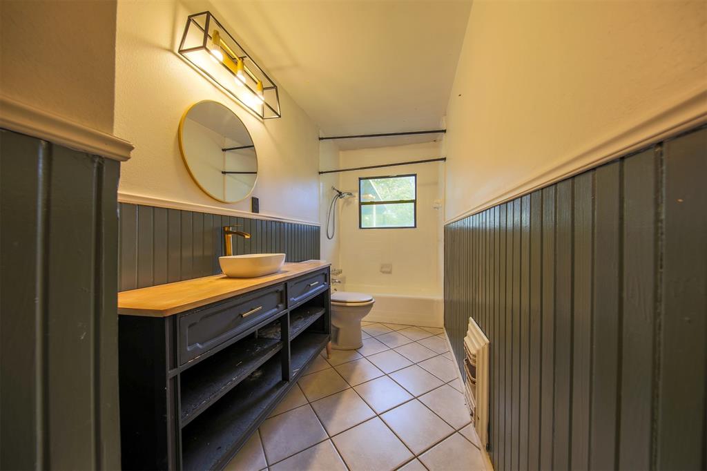 1004 Pecan Street Canton, TX 75103 - Photo 15 of 21 a room with storage and utility