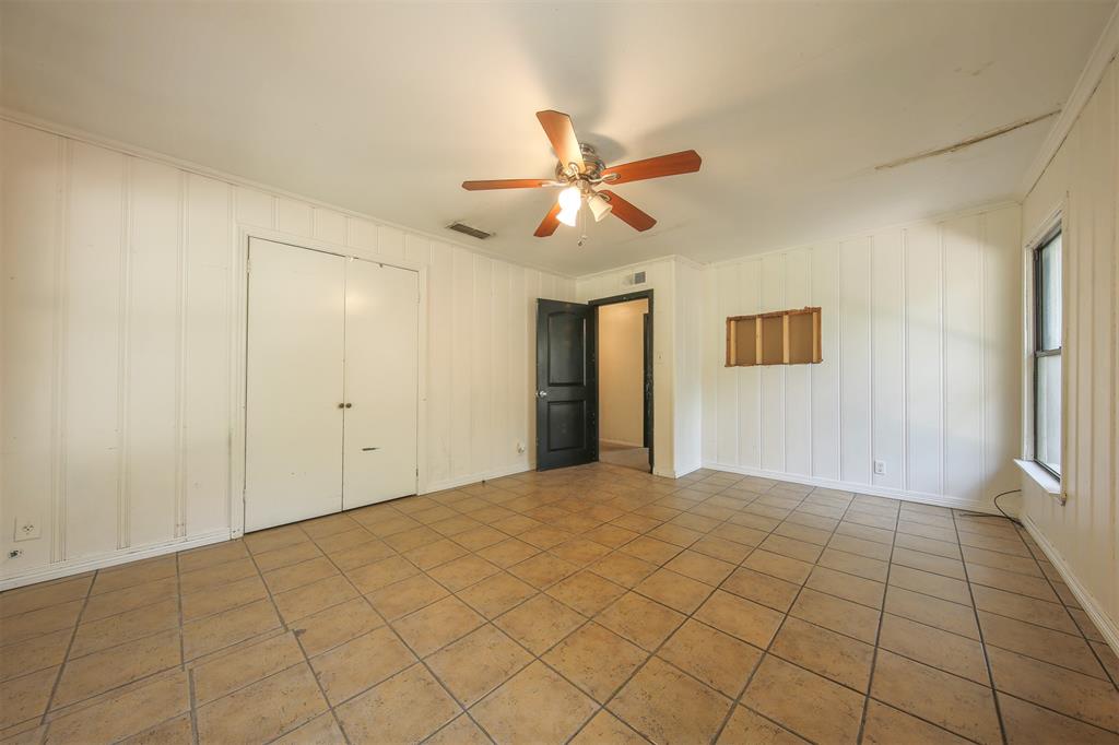 1004 Pecan Street Canton, TX 75103 - Photo 17 of 21 a view of a livingroom with a ceiling fan and window