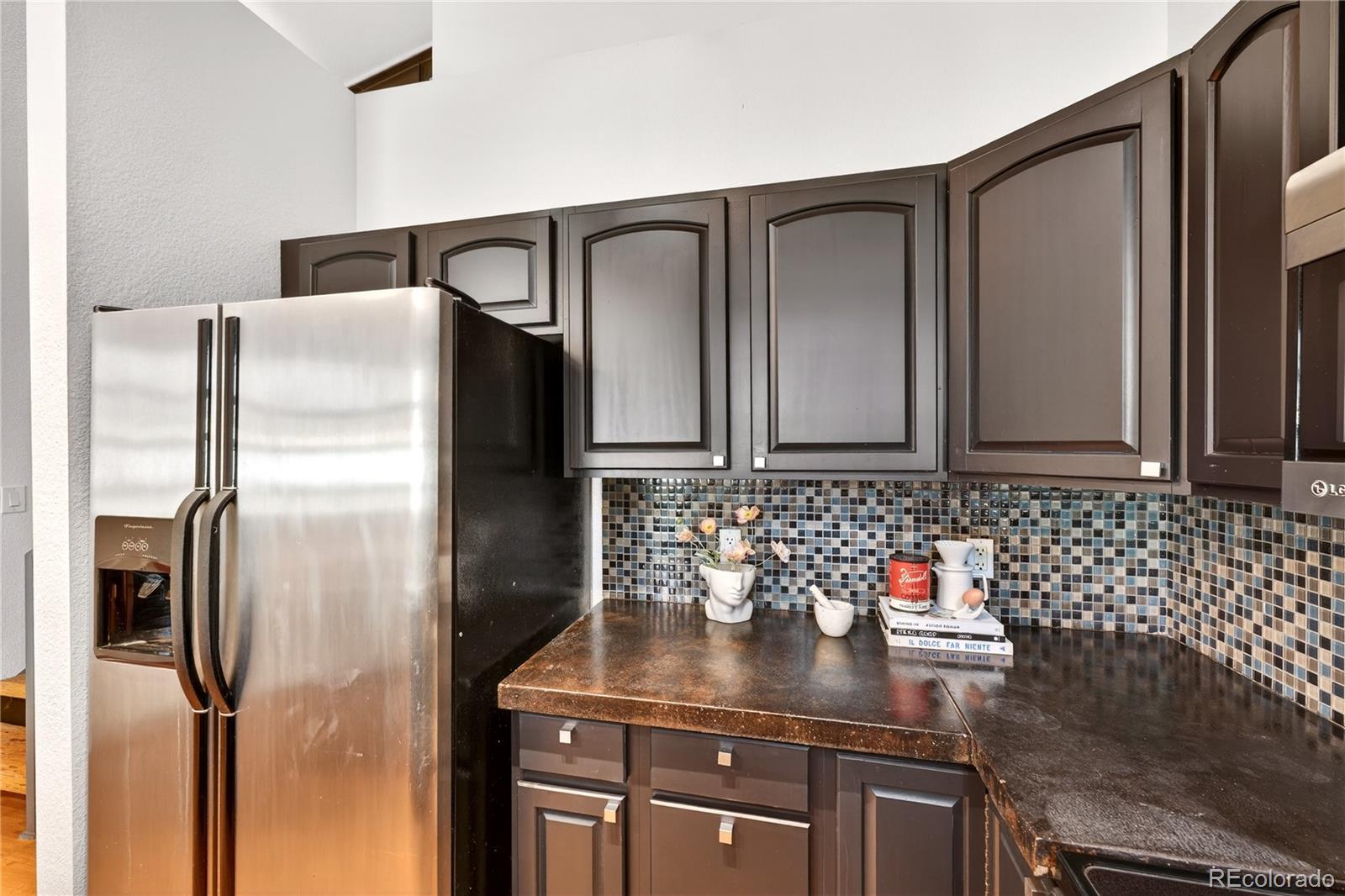 1421 Oneida Street, Unit 7 Denver, CO 80220 - Photo 12 of 22 a bathroom with shower sink and mirror