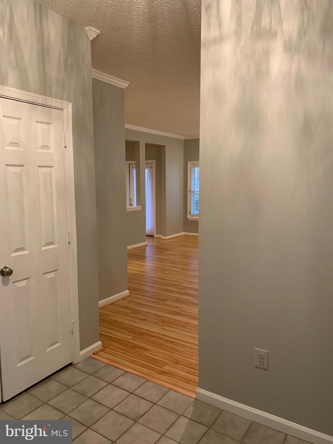 12009 Taliesin Place, Unit 12 Reston, VA 20190 - Photo 3 of 15 Tiled Foyer